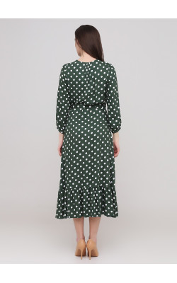 Зелена сукня в горохи на запах з воланом внизу